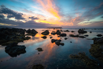 Fototapeta premium Sunset on the Wellington coast in New Zealand