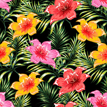 Seamless pattern of a tropical palm tree, jungle leaves and flowers. Hand drawing. Vector floral pattern. © podtin