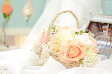 Wedding decoration with flowers in a basket