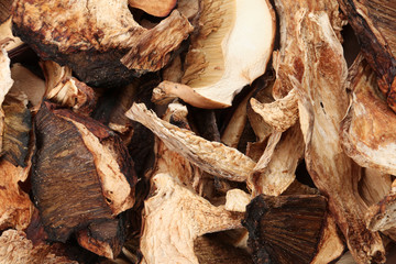 Delicious dried slices of mushrooms as background, closeup view