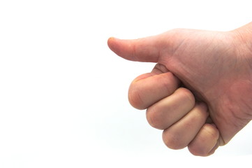 A fist with the thumb up isolated