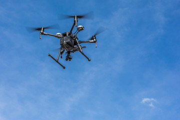 Drone flying and working for ortophoto and thermal analysis of PV Plants with visual and thermal camera. UAV are used for easy aerial inspections of Solar, Wind and Hydro renewable energy resources