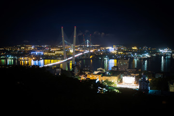Fototapeta na wymiar The Zolotoy Golden Bridge is cable-stayed bridge across the Zolotoy Rog (Golden Horn) in Vladivostok, Russia 