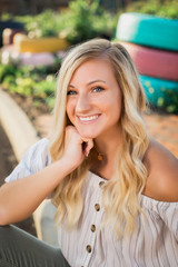 High School Senior Photo of Blonde Caucasian Girl Outdoors