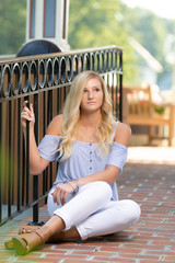 High School Senior Photo of Blonde Caucasian Girl Outdoors