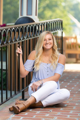 High School Senior Photo of Blonde Caucasian Girl Outdoors