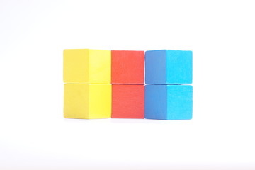 Colorful stack of wood cube building blocks