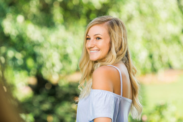 High School Senior Photo of Blonde Caucasian Girl Outdoors