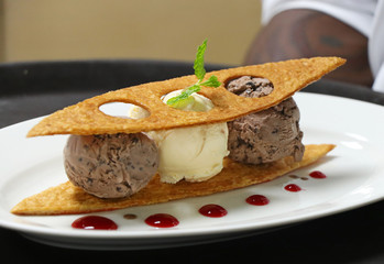 chocolate and vanilla ice cream in a plate