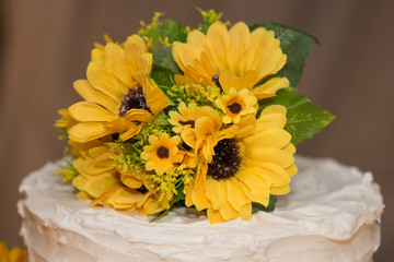 floral arrangement with artificial sunflower at wedding