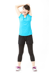 スポーツウェアを着た女性　ストレッチ
