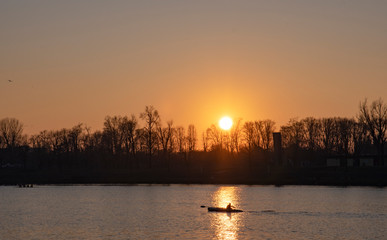 Canoe in the ray of the sun