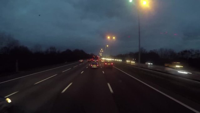Drive Lapse of Lorry (Truck) driving through busy tush hour traffic on the M25 motorway in the UK