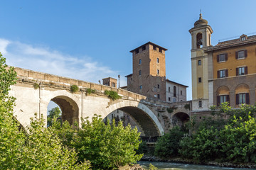 Fototapeta na wymiar Cityscape with Castello Caetani, Tiber River and Pons Fabricius in city of Rome, Italy