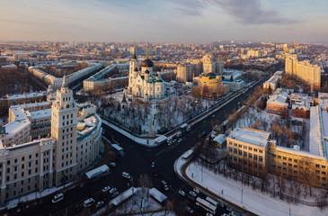Obraz premium Evening winter Voronezh downtown cityscape. Tower of management of south-east railway and Annunciation Cathedral