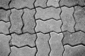 black and white brick walk path in public park