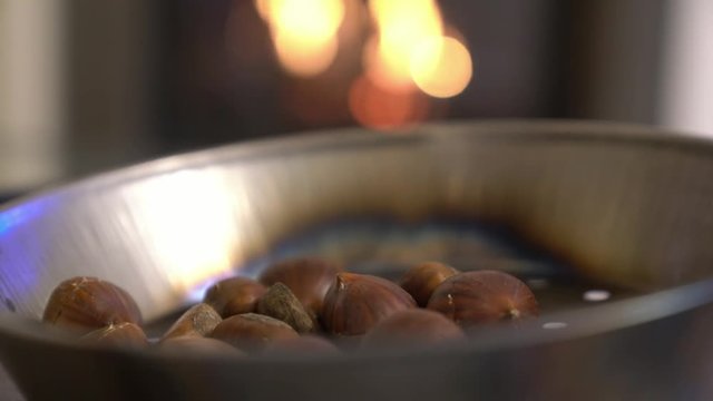 4K clip, a man slices chestnuts