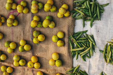 Limes and peas small group like beautiful composition in asian street market