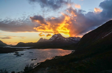Fototapeta na wymiar sunset moment with mountain range in Lofoten Islands Norway