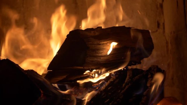 Firewood catching fire in a Tile Stove / Cockle