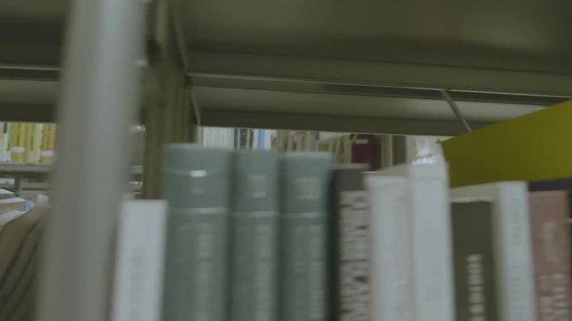 Books in a bookshelve.