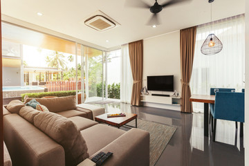 luxury modern living room interior, big glass open doors and transparent walls
