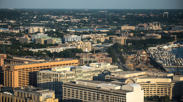 Arial view (above) of Downtown Washington, DC, USA  - Government departments buildings view  and shadow of the National Monument.