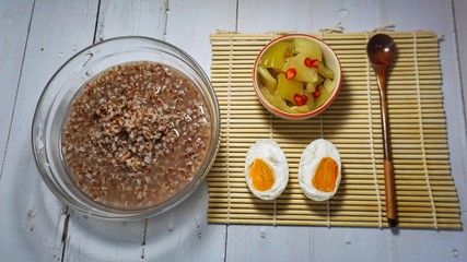 Rice boiled with Pickled Chinese mustard and Salted egg.