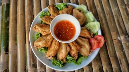 Fried chicken with sauce.