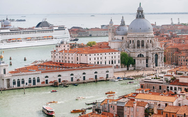 Fototapeta na wymiar The Busy City of Venice: Cruise Ship and Santa Maria della Salute