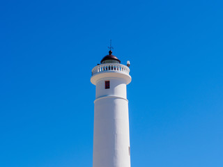 White Lighthouse  with a blue sky