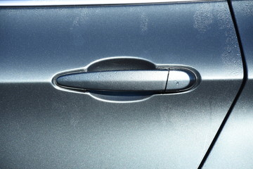 gray green car door handle,