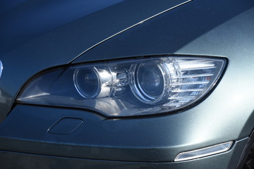 Obraz na płótnie Canvas Modern auto headlight ,Car wash 