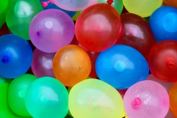 Fototapeta na wymiar Little Colorful Water Balloons Background Macro