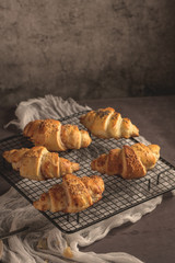 Baked croissants with strawberry jam