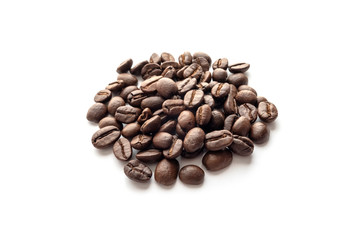 Roasted coffee beans isolated on white background. Close-up.