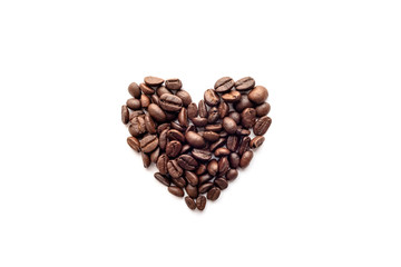 Heart shape of roasted coffee beans isolated on a white background.