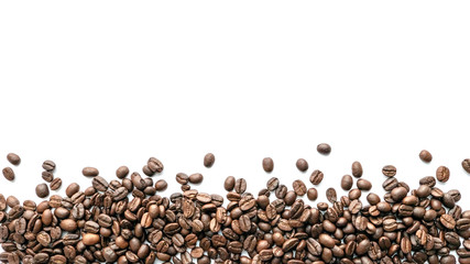 Roasted coffee beans on white background. Close-up.