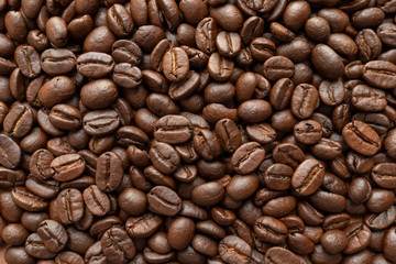 Roasted of coffee beans for background. Close-up.