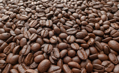 Roasted of coffee beans for background. Close-up.