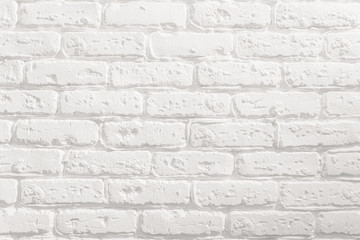 Fototapety  White painted brick wall in a modern loft apartment. Background texture