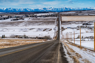 Rural road running through a farm landscape