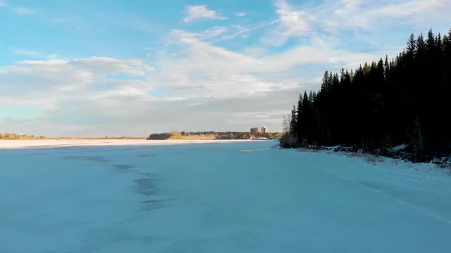 Frozen Lake With Snow And Forest On Shoreline 2