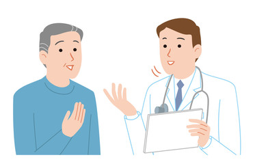 医者と会話する高齢者