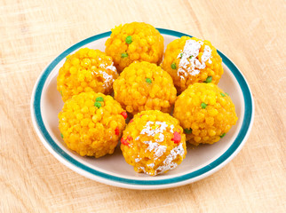 Laddu also know as laddoo, ladoo, laddo are ball-shaped sweets popular in the Indian festivals. Laddu are made of flour, minced dough and sugar with other ingredients.