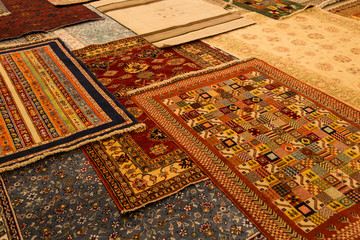 The carpets on the background in the shop for special costumers from Nevsehir, Sivas and other...