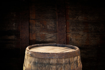 background of barrel and worn old table of wood