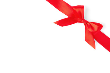 Red ribbon bow isolated on white background.