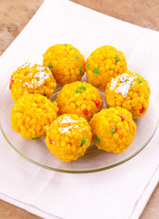 Laddu also know as laddoo, ladoo, laddo are ball-shaped sweets popular in the Indian festivals. Laddu are made of flour, minced dough and sugar with other ingredients.