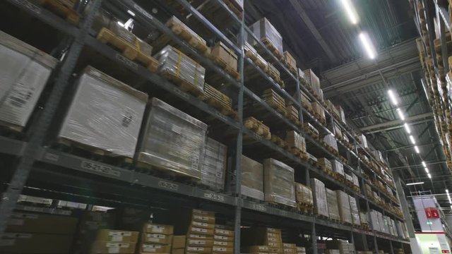 Interior of a multi-level warehouse. Steadicam shot
